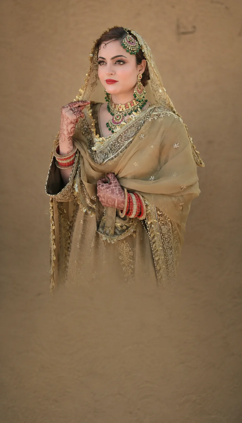 Manhar bride in hand-embroidered gold couture